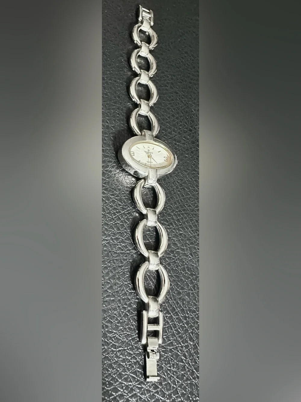 Minicci Silver and Gold-Tone Oval Bracelet Watch